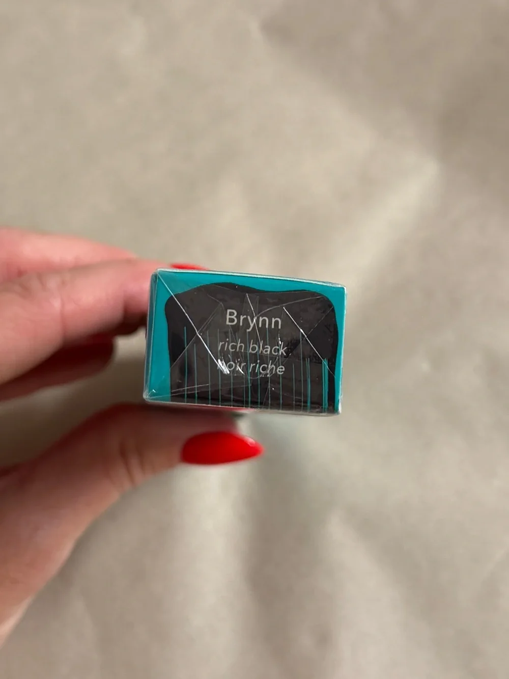 Thrive Causemetics Mascara in Teal Packaging with Black Accent